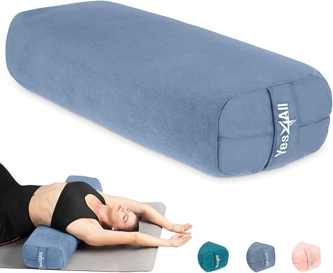 sponge yoga bolster pillow and a woman using it